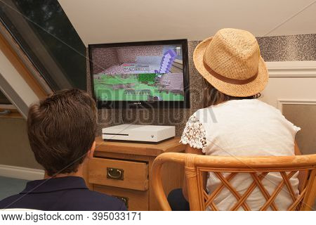 A Brother And Sister Playing The Computer Game Minecraft On An Xbox, Taken On The 13th Of August In 