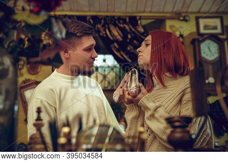 Shoe. Smiling Family, Caucasian Couple Looking For Home Decoration And Holidays Gifts In Household S