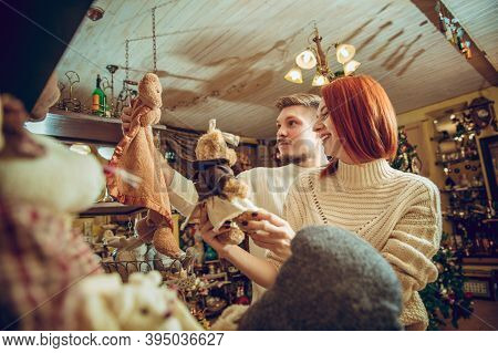 Handmade. Smiling Family, Caucasian Couple Looking For Home Decoration And Holidays Gifts In Househo