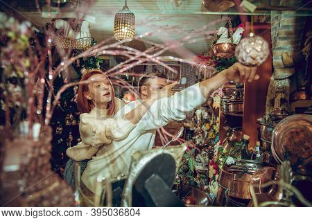 Lovely. Smiling Family, Caucasian Couple Looking For Home Decoration And Holidays Gifts In Household