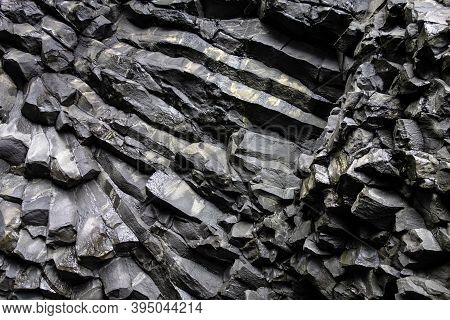 Wall Of Black Basalt Rocks Near Halsanefshellir Cave In Iceland, Europe