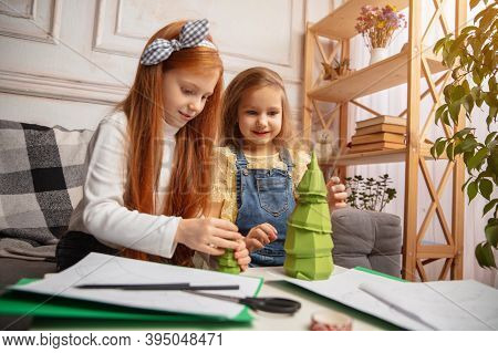 Gift. Two Little Children, Girls Together In Creativity Of The House. Happy Kids Make Handmade Toys 