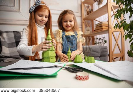 Gift. Two Little Children, Girls Together In Creativity Of The House. Happy Kids Make Handmade Toys 