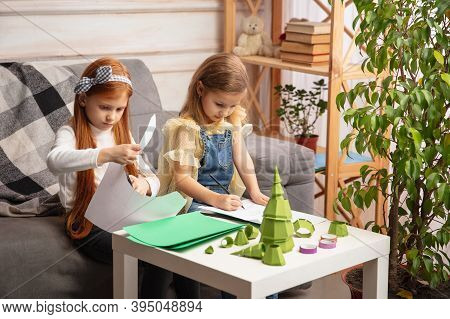 Artwork. Two Little Children, Girls Together In Creativity Of The House. Happy Kids Make Handmade To