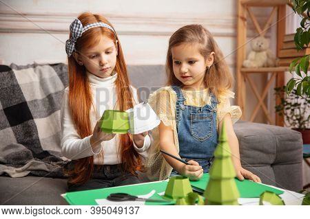 Happiness. Two Little Children, Girls Together In Creativity Of The House. Happy Kids Make Handmade 