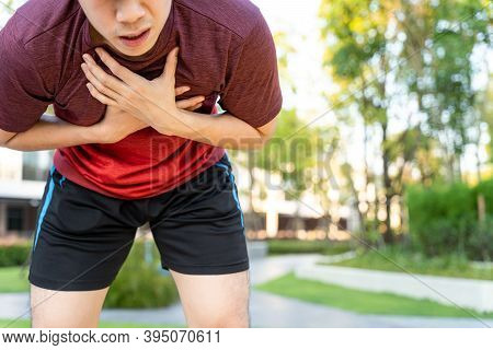 Exhausted Male Runner Athlete Suffering Painful Angina Pectoris Or Asthma Breathing Problems While R