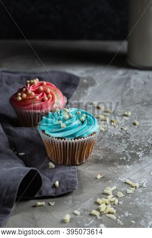 Homemade Muffin With Fresh Berries Around Next To A Bottle Of Milk On A Table And On A Dark Backgrou