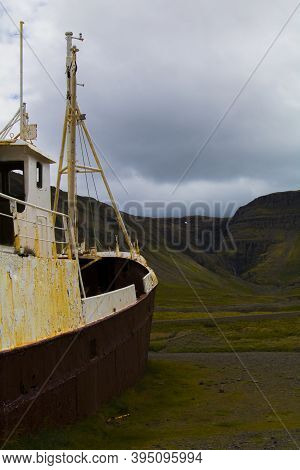 An Out-of-the-way Whaling Ship That Rusts On The Road To Látrabjarg On A Dead Cloudy Day. The Shipwr
