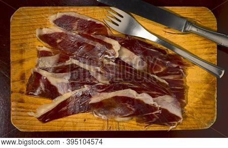 Slices Of Spanish Iberian Ham. It Is One Of The Most Exquisite Pork Products