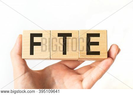 Word Fte. Wooden Small Cubes With Letters Isolated On White Background With Copy Space Available.bus