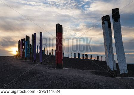 Bottrop, Germany - December 31, 2020: Totems On Haniel Tip, Landmark Of Ruhr Metropolis Against Rain