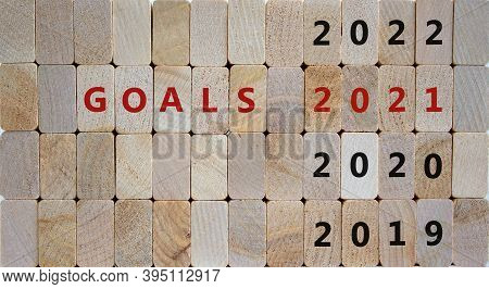 Business Concept Of Planning 2021. Wooden Blocks With The Inscription 'goals 2021'. 2019, 2020, 2022