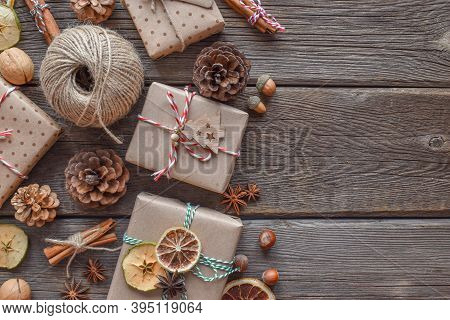 Christmas Wooden Background With Natural Products For Decorating Gifts . Zero Waste. Happy New Year.