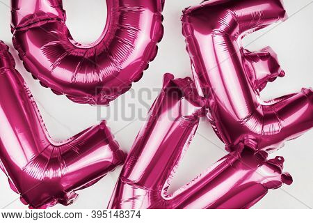 Pink love blown up balloons