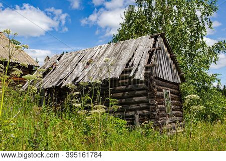 An Old Abandoned Hut On The Shore. Lake Tagasuk. Krasnoyarsk Territory, Siberia, Russia