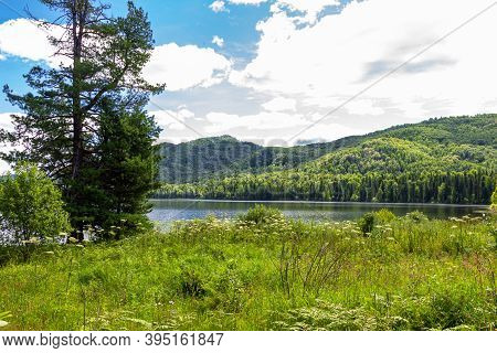 Cloudy Landscape At Lake Tagasuk. Krasnoyarsk Region, Russia