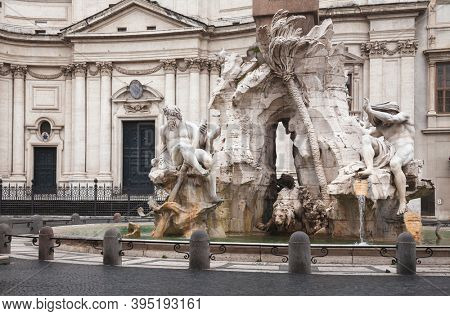 Fontana dei Quattro Fiumi (Fountain of the Four Rivers) featuring river gods at Piazza Navona, Rome, Italy