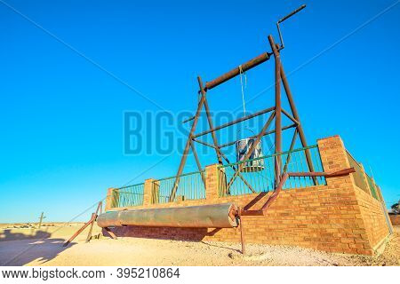 Well Of Old Mines In The Big Winch Lookout Of Coober Pedy Town In Australia. Located In South Austra