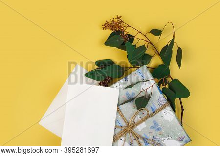 Postcard Mockup, Gift Present Box, Eucalyptus. Winter Natural Christmas Holiday Background. Top View