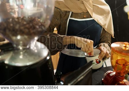 Female Batender Showing Process Make A Coffee