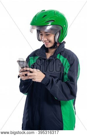 Asian Beautiful Delivery Courier With Helmet Holding Smartphone