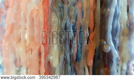Selective Focus To Solid Grey Wax Droplet Closeup. Colorful Melted Candle Drips In Shape Of Solid Dr