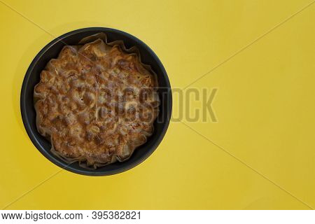 Cooked Apple Pie On A Yellow Background.