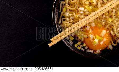 A Noodle Soup With Egg And Leek.