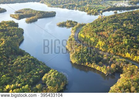 Aerial View Of Curving Road Along The Mississippi River Near Brainerd, Minnesota In The Fall.