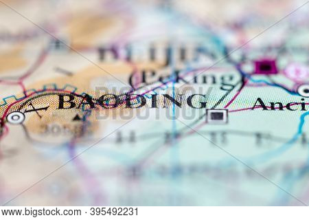 Shallow Depth Of Field Focus On Geographical Map Location Of Baoding China Asia Continent On Atlas