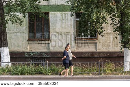 Pavlodar, Kazakhstan - July 27, 2020: Strawling People On A Summers Day In Pavlodar.