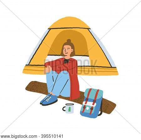 Traveling Alone Concept. Young Woman Sitting On Log Near Camping Tent. Enjoying Outdoor Recreation I
