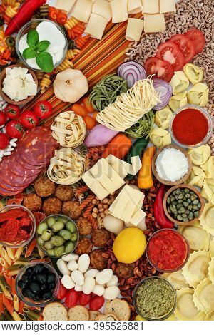 Italian health food for a low cholesterol diet. Mediterranean collection of foods high in antioxidants, anthocyanins, fibre, lycopene, omega 3 & protein. Flat lay, top view.