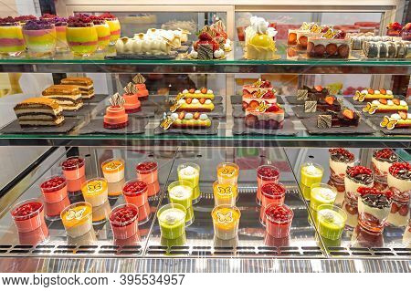 Assortment Of Pastries And Cakes In Patisserie Display