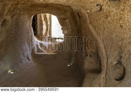 Uchisar, Turkey - October 4, 2020: This Is A Tunnel Dug In Ancient Times In The Tuff Rock Of Uchisar