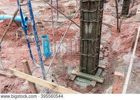Column Formwork Internal Steel Structure Made Up Of Poles From The Ground. Column Timber Form Work A