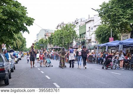 Buenos Aires / Argentina; Nov 14, 2020: People Walking On A Temporarily Pedestrianized Street To Fac