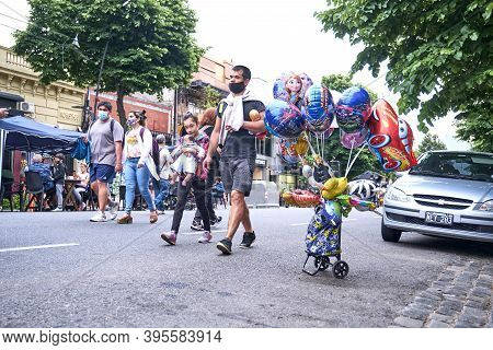 Buenos Aires / Argentina; Nov 14, 2020: People Walking On A Temporarily Pedestrianized Street To Fac