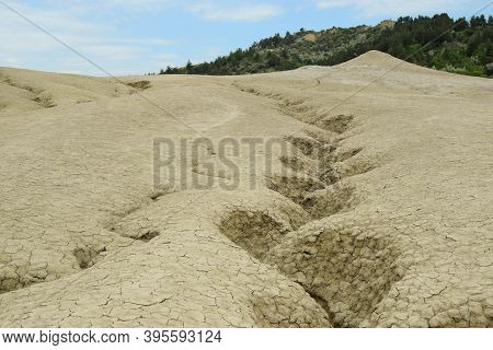 Landscape With Cracked Soil. Ground Shape Created By Muddy Volcanoes And Natural-gas Eruptions In Be