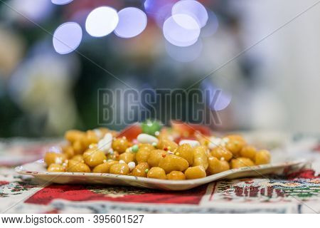 Homemade Sweet Italian Struffoli, Shortcrust Balls Fried And Dipped In Honey With Sprinkles. Typical