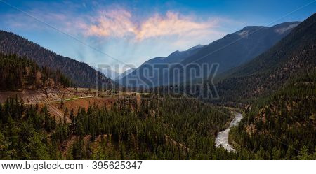 Aerial Panoramic View Of A Scenic Dirt Road Towards Gold Bridge In The Valley Surrounded By Canadian