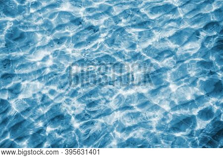 Sea Wave Background. Calm Waves On Shallow Water. Ripples On Lake Water. Blue Lake Surface Texture. 