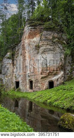 Anfabrika Rocks And Cellars In Ligatne Town An Old Floodgate Dam. Ancient Sandstone Caves And Ancien