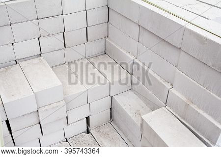 White Silicate Brick Is Laid. Stack Of Silicate Bricks For Construction