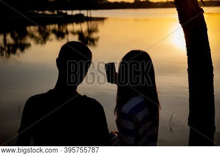 Sunset Silhouette At The Lake In Nakhon Ratchasima, Thailand, Taken With A Digital Camera