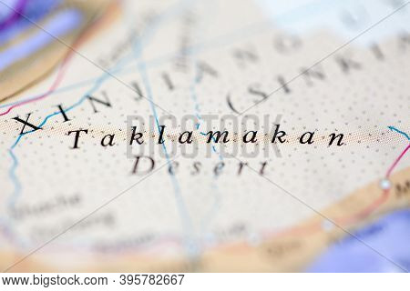 Shallow Depth Of Field Focus On Geographical Map Location Of Taklamakan Desert China Asia Continent 