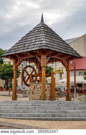 Checiny, Poland - September 06, 2020: Historic Well On The Market Of The Old Town.