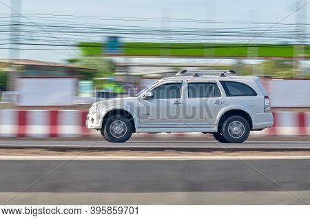 Samut Sakhon, Thailand: Isuzu Mu7 A White Car Is Currently Running On Urgent Traffic On Rama 2 Road 