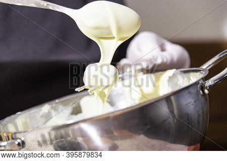 Coating Christmas Cookies With White Couverture Chocolate