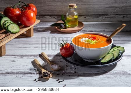 Gazpacho. Traditional Spanish Tomato Soup With Fresh Tomatoes, Fresh Cucumber And Olive Oil, On Whit